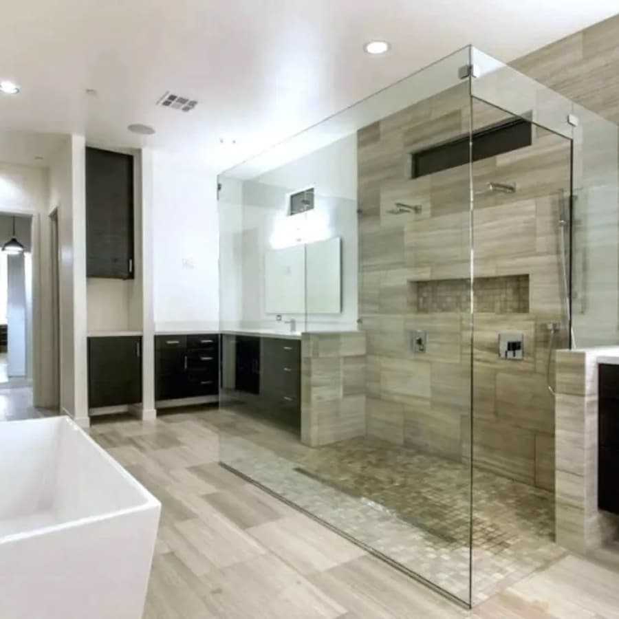 Master bathroom suite with double vanity and soaking tub